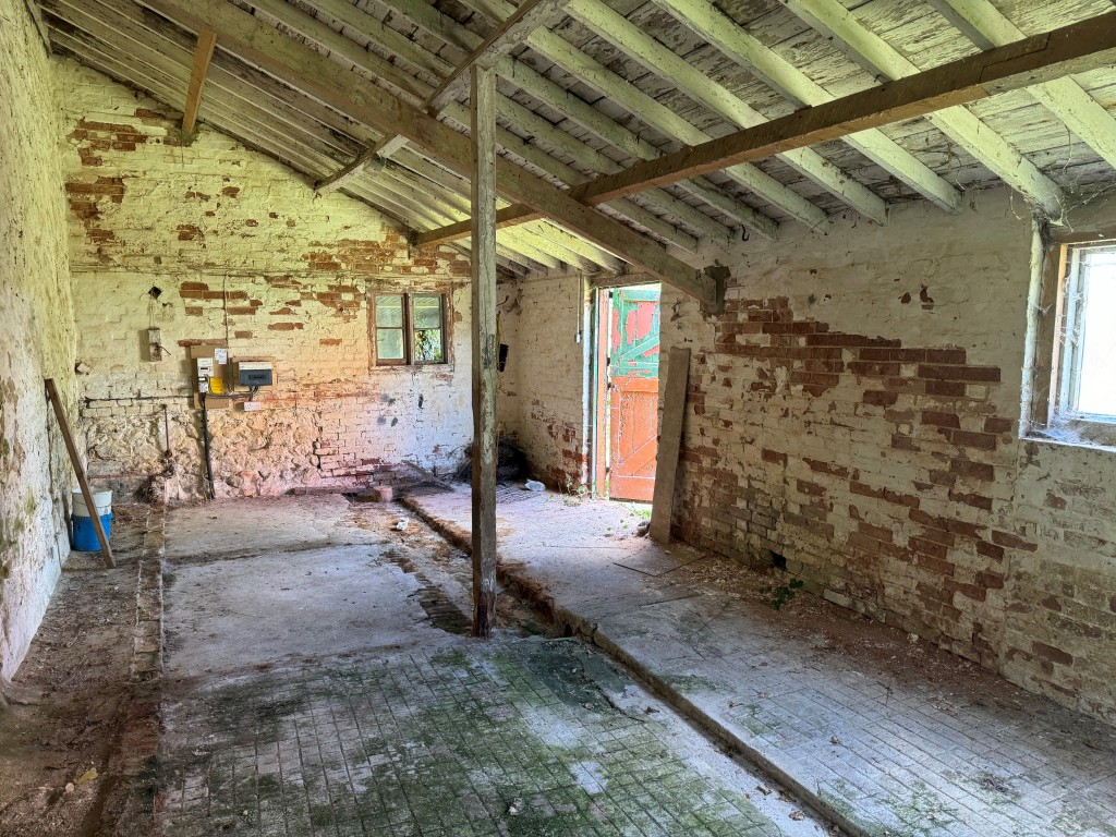 Lot: 56 - LAND AND TWO BARNS WITH CONSENT FOR RESIDENTIAL CONVERSION - Library Photograph of an internal View of the Smaller Barn